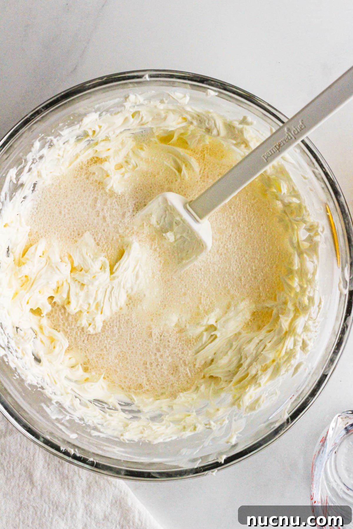 Beer poured into cream cheese