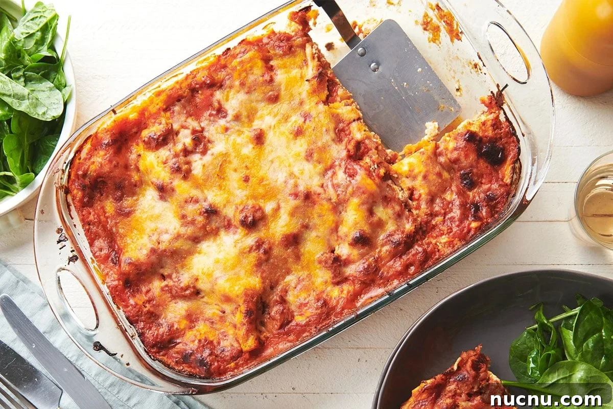 Ultimate Baked Pasta Recipes for Crowd-Pleasing Dinners 2 Turkey lasagna in pan on table.