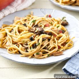 Ultimate Baked Pasta Recipes for Crowd-Pleasing Dinners 9 Chicken tetrazzini on white plate.