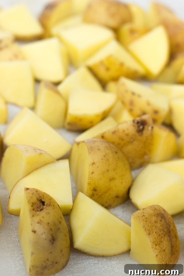 Chopped yellow potatoes for warm roasted potato salad
