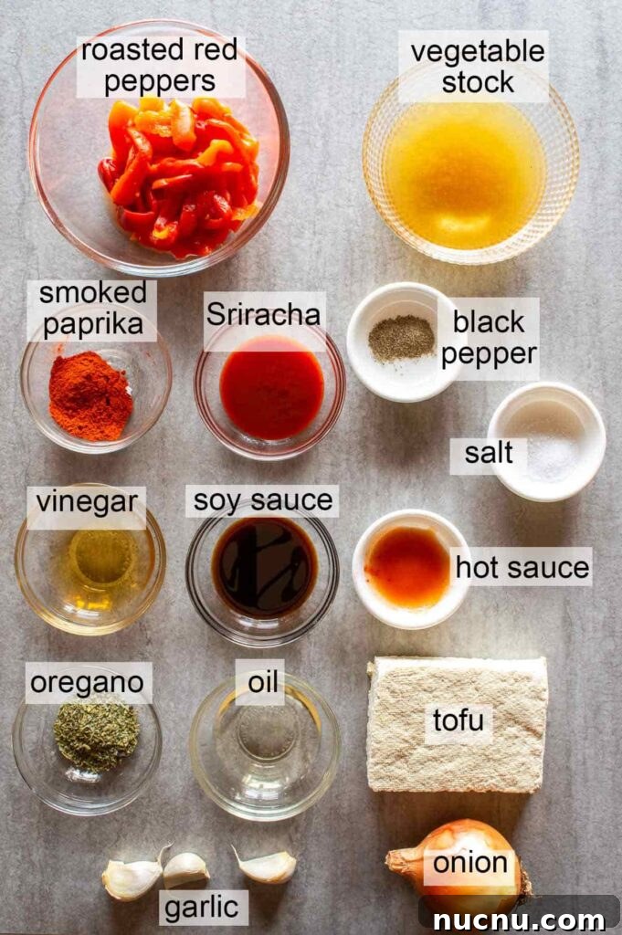 Fiery Peri-Peri Tofu Recipe for Bold, Smoky Flavor 3 listed ingredients for peri peri tofu: vegetable stock, roasted peppers, black pepper, salt, tofu, onion, garlic, oregano, vinegar, paprika, Sriracha sauce, soy sauce, oil