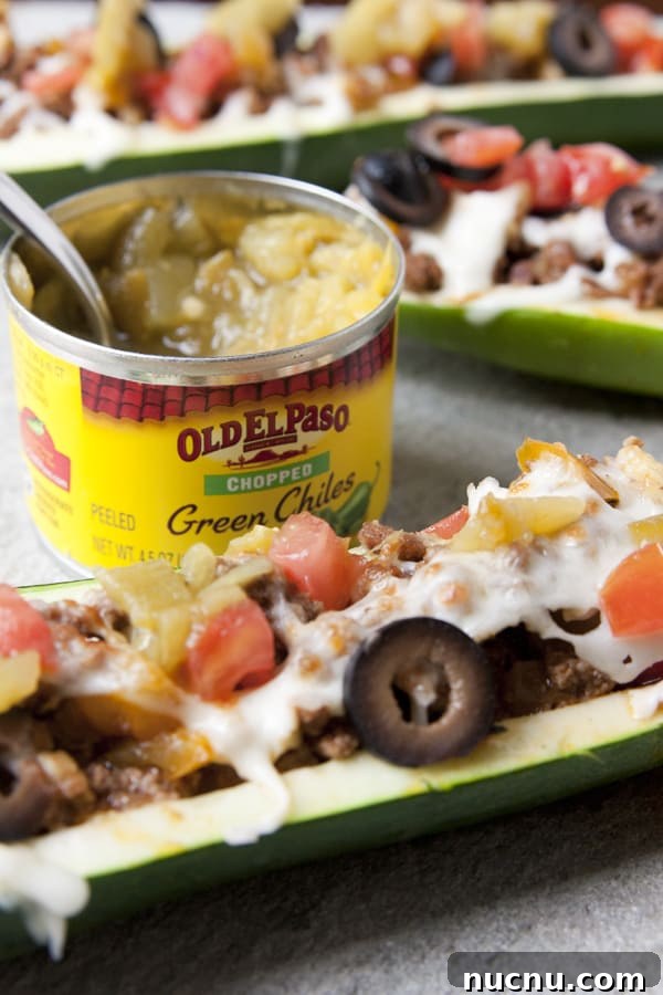 Stuffed Zucchini Boats with Savory Picadillo Filling 2 Old El Paso green chile ground beef stuffed zucchini boats