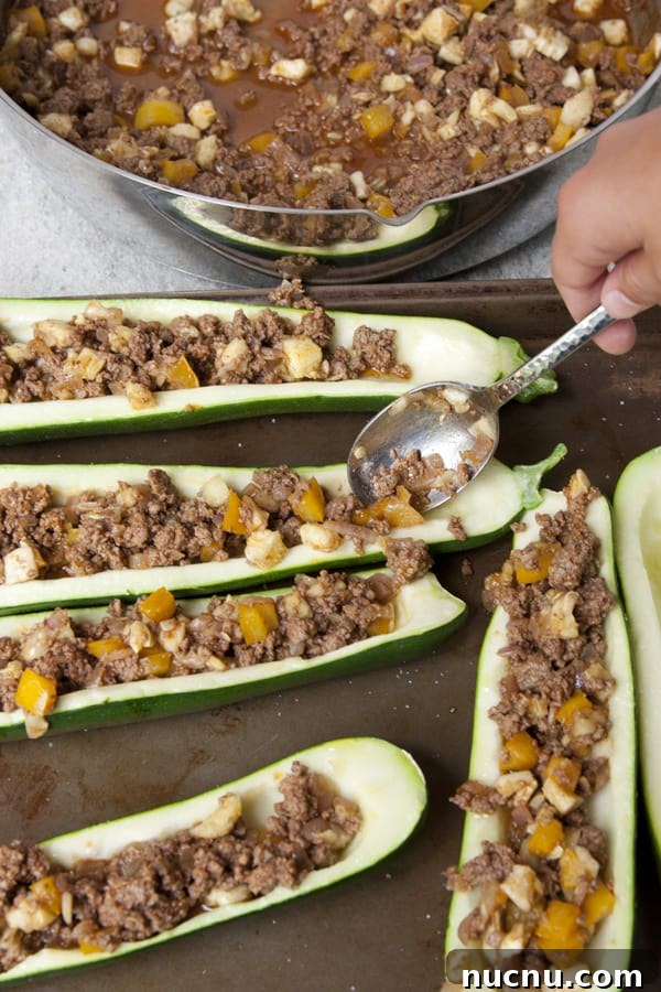 Stuffed Zucchini Boats with Savory Picadillo Filling 5 ground beef zucchini boats
