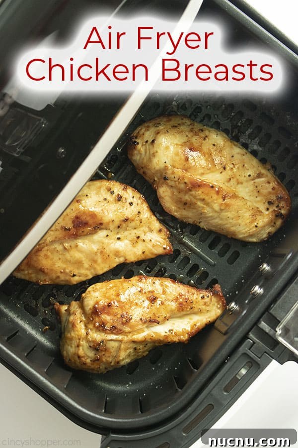 Juicy Air Fryer Chicken Breasts: Quick Crispy Recipe in 20 Minutes 6 Text on image Air Fryer Chicken Breasts 3 cooked breasts basket