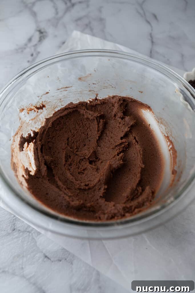 Chewy Chocolate Sugar Cookie Bars Recipe for Chocolate Lovers 6 mixed ingredients in a bowl