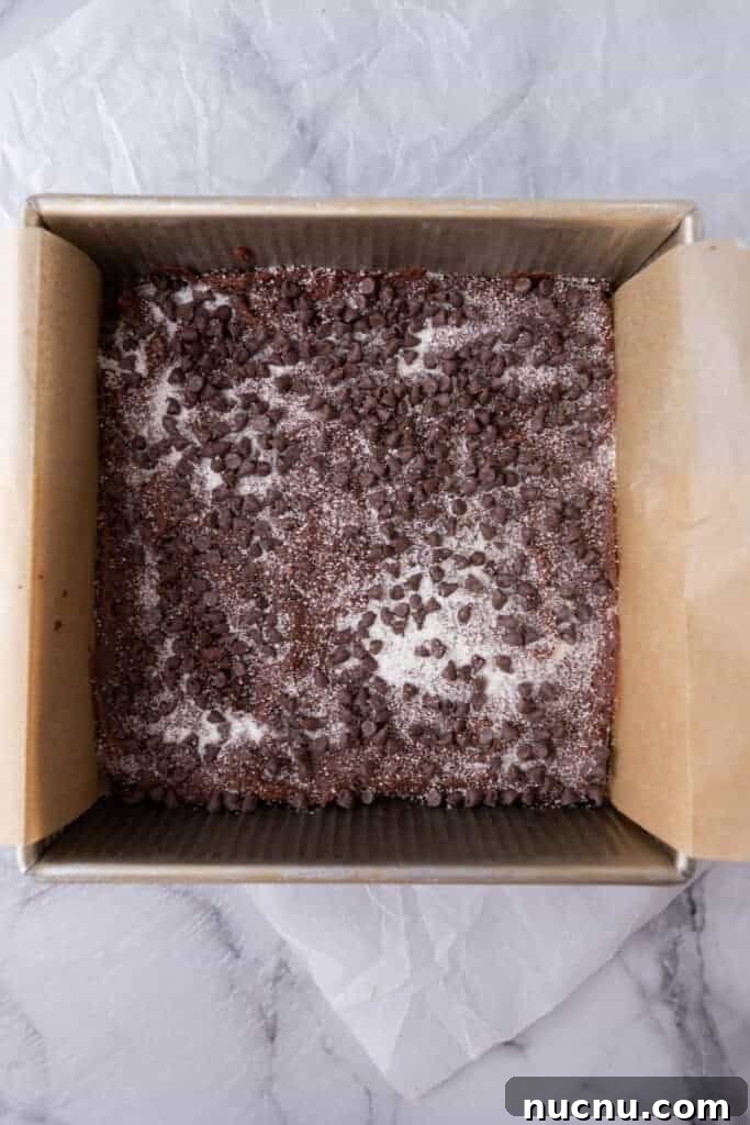 Chewy Chocolate Sugar Cookie Bars Recipe for Chocolate Lovers 7 dough in a pan