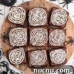 Spider Web Brownies: How to Make Spooky Halloween Brownies Quickly 11 overhead shot of a board with spider web brownies.