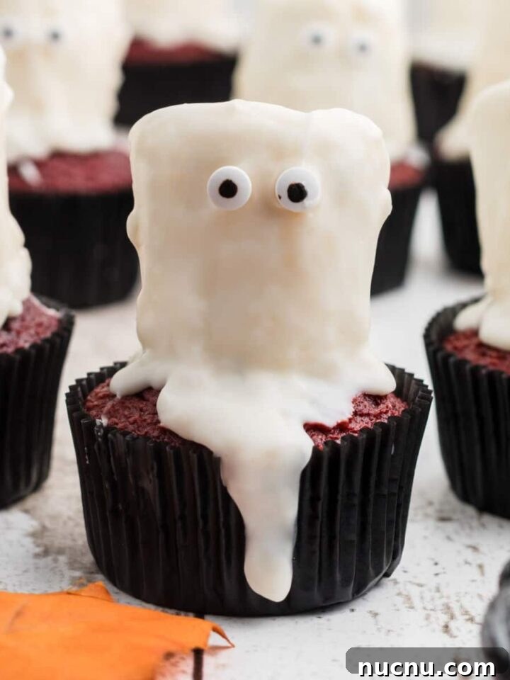 Spider Web Brownies: How to Make Spooky Halloween Brownies Quickly 7 Close up of a ghost cupcake.