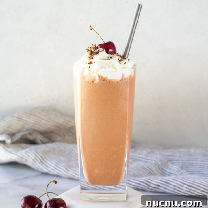 Chocolate Peanut butter Milkshake on a white coaster