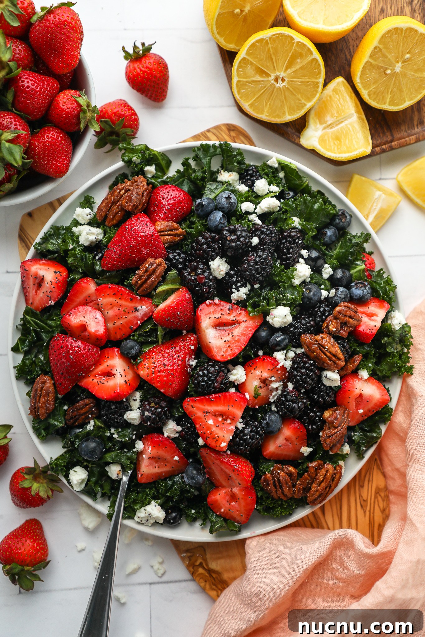 Mixed Berry and Kale Salad with Lemon Poppy Seed Dressing 4 This mixed berry kale salad is perfect to serve for any outdoor party, potluck or bbq this year! It's sweet, creamy and so refreshing too!