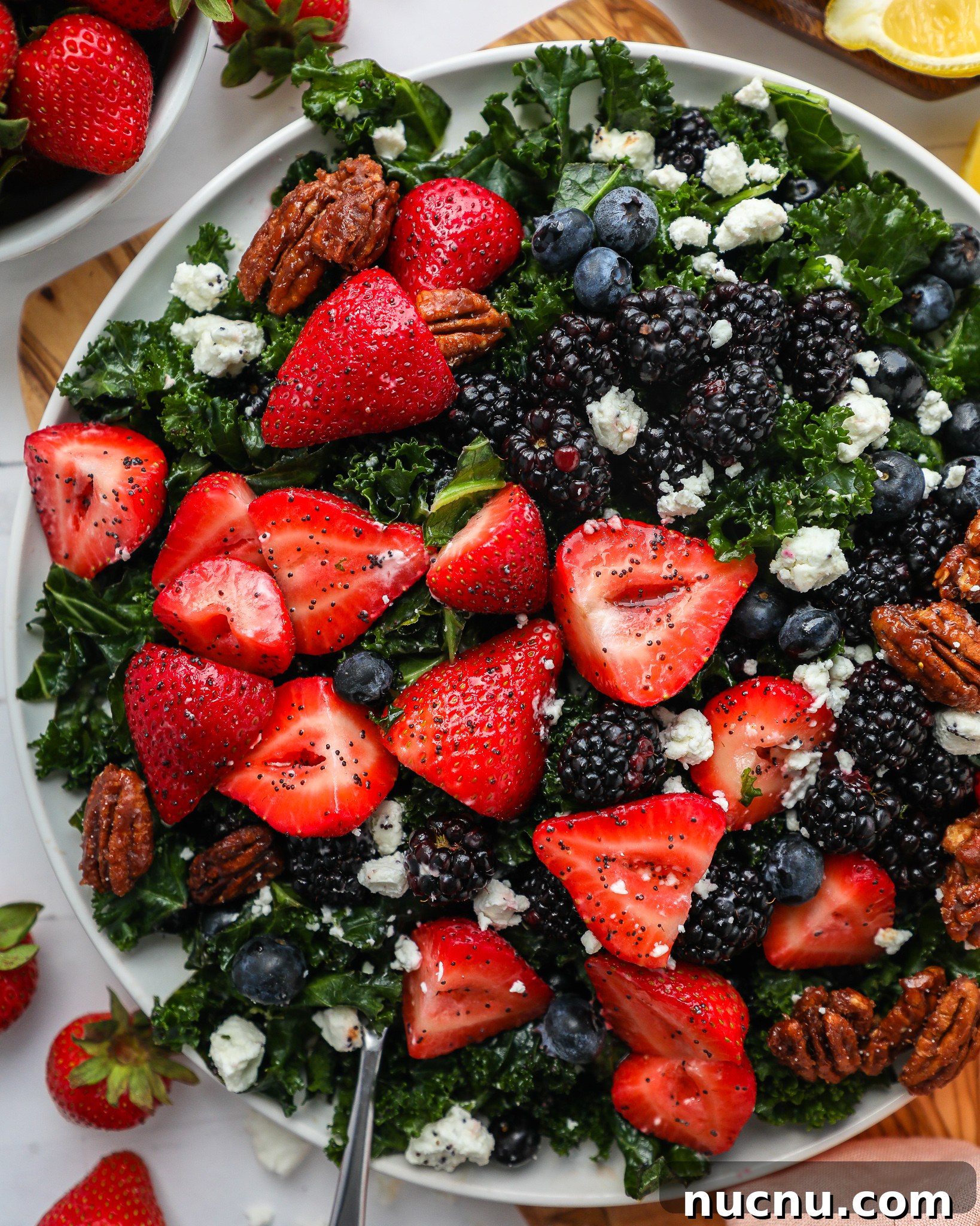 Mixed Berry and Kale Salad with Lemon Poppy Seed Dressing 6 Tender kale is tossed with strawberries, blackberries, blueberries and goat cheese to make this delicious spring salad!
