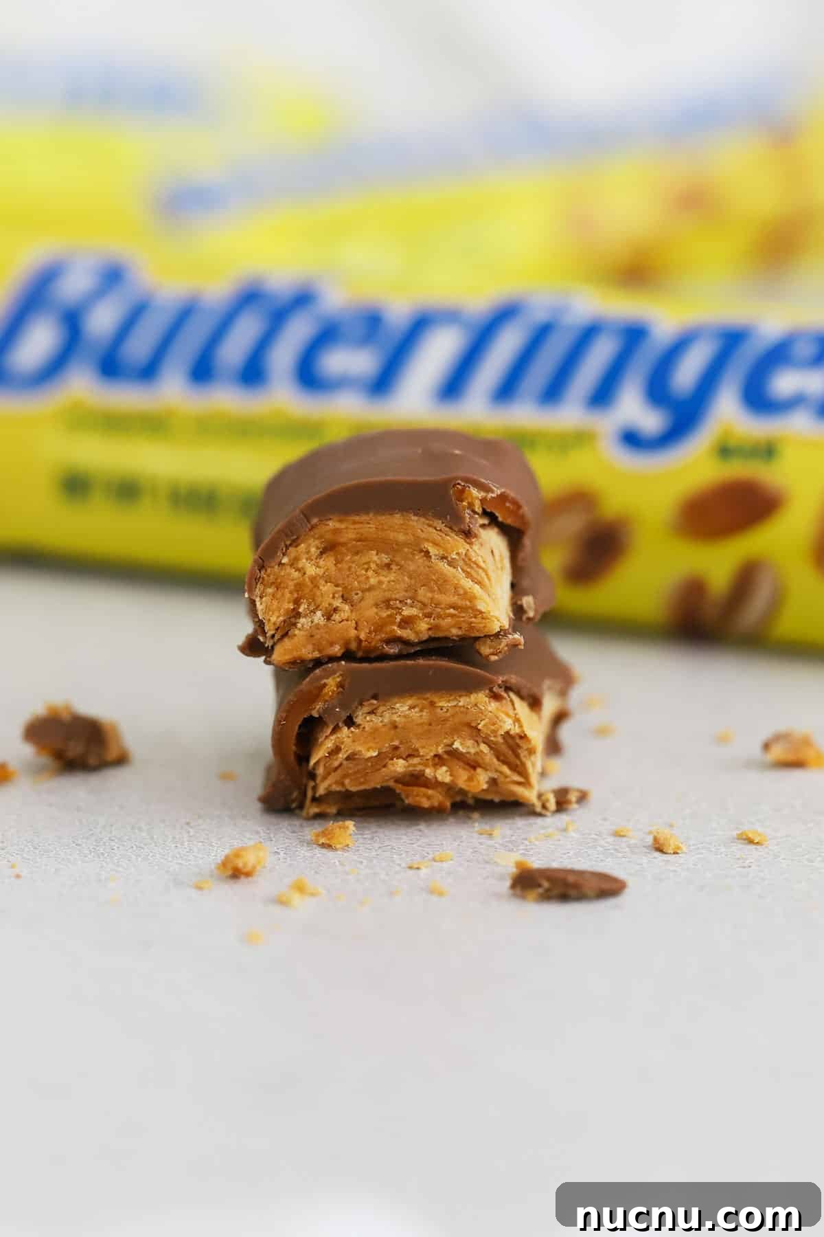 a butterfinger candy bar cut in half and stacked