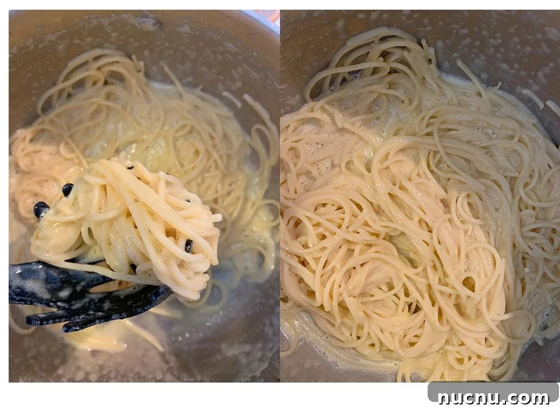 Creamy Smoked Salmon Carbonara Recipe for Quick Weeknight Dinners 4 A pot full of spaghetti and slightly cooked carbonara sauce.