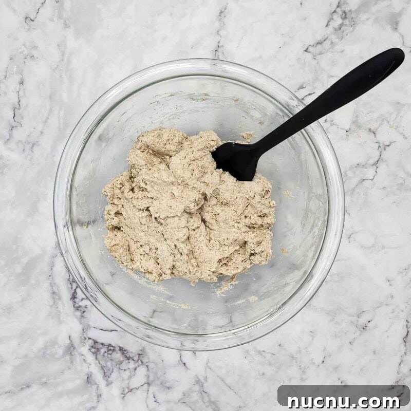 Combine the wet and dry mixtures until a dough forms.