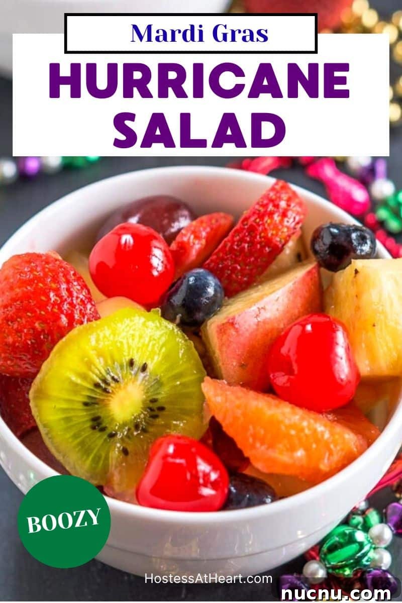 Boozy Mardi Gras Fruit Salad Recipe for Festive Parties 8 Bright colorful fruit in a white bowl mixed with alcohol to make a Mardi Gras Hurricane salad. Hostess At Heart