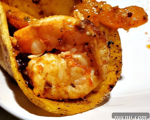 Blackstone Griddle Shrimp Fajitas Recipe — Juicy Sizzling Skillet Meal 8 Shrimp Fajitas rolled in a corn tortilla